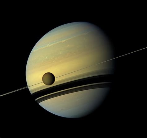 Cassinis Last Titan Flyby Reveals Deep Methane Lakes Earth Like