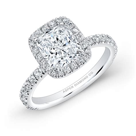 The cushion cut resembles a pillow and has an antique feel and a distinctive, romantic appearance. Cushion Cut Diamond Halo Engagement Ring in Platinum - Bridal