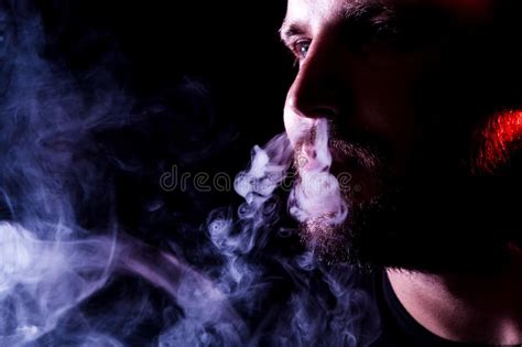 A Young Man Exhales A Cloud Stock Image Image Of Abstract Color