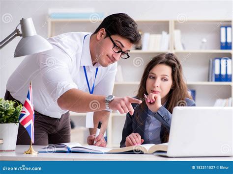 Teacher Explaining To Student At Language Training Stock Image Image