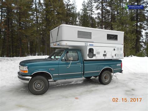 Old F250 With A Four Wheel Pop Up Truck Camper Fwc