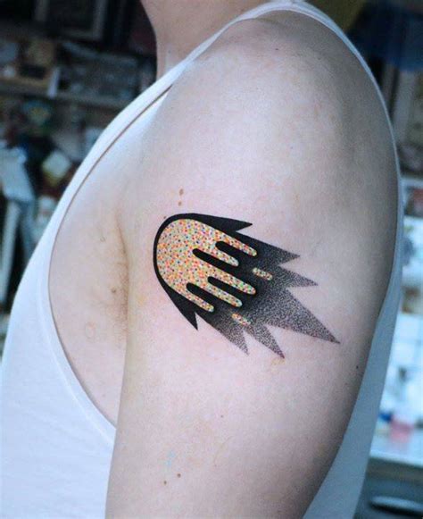 Comet Tattoo On The Left Upper Arm