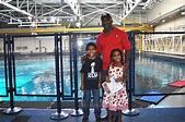 Cruiserweight champion Evander Holyfield and his large family: wife, kids