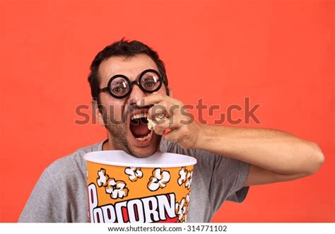 Young Man Eating Popcorn Stock Photo 314771102 Shutterstock