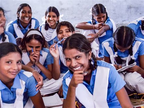 Young Indian Village School Girls Smiling In School Uniform Right To
