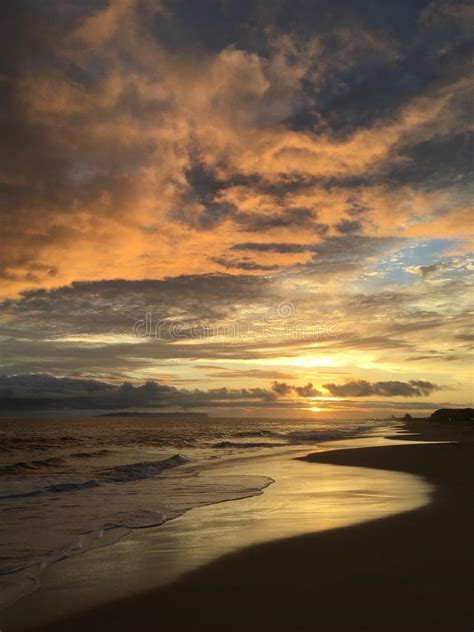 Pacific Ocean Waves At Beach In Kekaha During Sunset On Kauai Island In Hawaii Stock Photo
