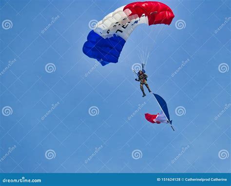 Red Parachute Is In The Amazing Blue Sky Military Parachutist Is