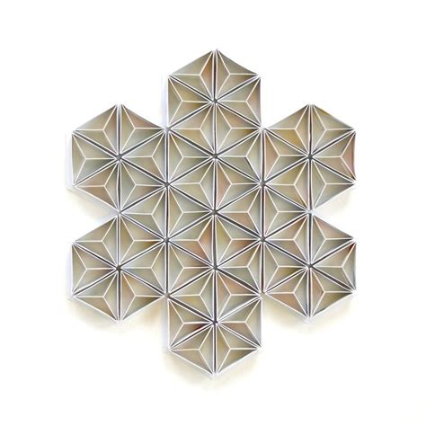 Geometric Snowflake Made Out Of Wrapping Paper From Impression