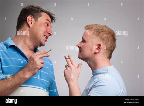Men Smoking Cigarettes Hi Res Stock Photography And Images Alamy