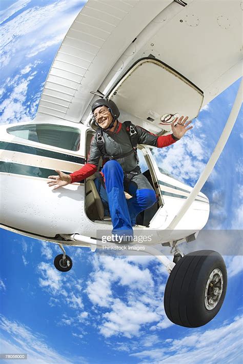 Parachutist Jumping From Airplane High Res Stock Photo Getty Images