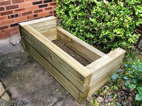 Sleepers can be fixed by means of galvanised straps; Railway sleeper pond project