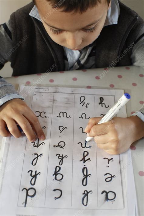 6 Year Old Boy Learning To Write Letters Stock Image C0170871