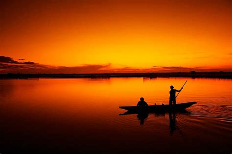 Hd Wallpaper Silhouette Of Two Men On Canoe During Sunset Fishing