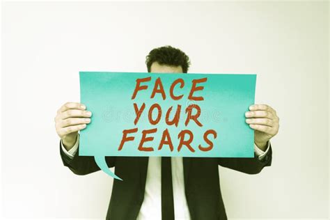 Sign Displaying Face Your Fears Internet Concept Strong And Confident