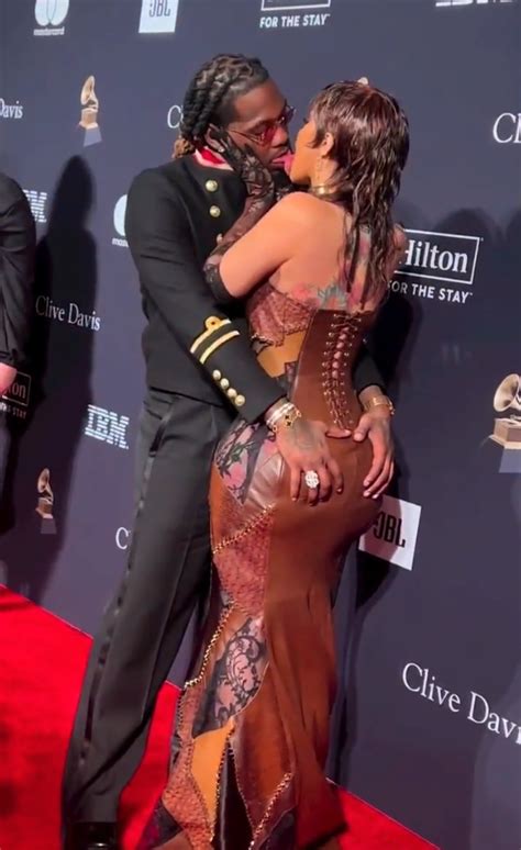 Cardi B And Offset Let Their Tongues Loose During Steamy Red Carpet Kiss