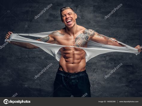 Athletic Man Ripping T Shirt Stock Photo By ©fxquadro 149392390