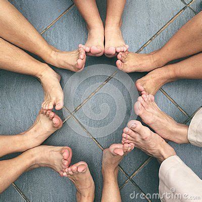 A Top Down Shot Of Six Friends Sitting In A Circle With Their Feet Touching People Sitting