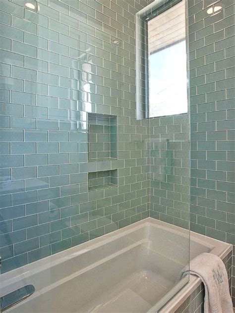 See how top designers create both timeless and trendy looks with marble, cement, ceramic, porcelain, faux wood and glass tile. 40 blue glass bathroom tile ideas and pictures 2020