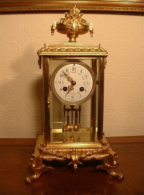 This clock is so convenient for daily use because it owns 4 different functions: 4 Glass Sided Clock. | 277977 | Sellingantiques.co.uk