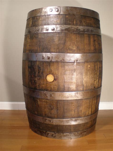 Contact local breweries or distilleries that may have empty whiskey or wine barrels you can purchase. Whiskey Barrel Cocktail Table