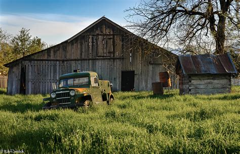 Old Jeep Old Barn Photograph By Mike Ronnebeck