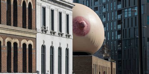 Maybe you would like to learn more about one of these? Mother London Put a Giant Boob on Top of a Building to ...