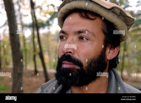 Portrait Of A Middle Aged Pashtun Afghan Man With A Beard And Wearing A