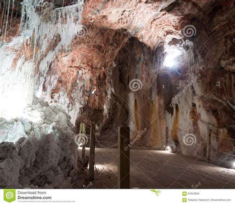 Natural Grotto At Cave With White Natural Stalactites Stock Photo