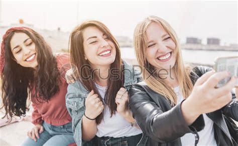 Group Of Happy Multiracial Female Tourists Having Fun And Smiling