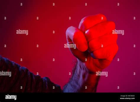 Closeup On Man Fists Clenched In Anger Stock Photo Alamy