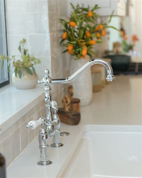 Bridge Style Sink Faucet With Porcelain Lever Handles In 2021 Sink