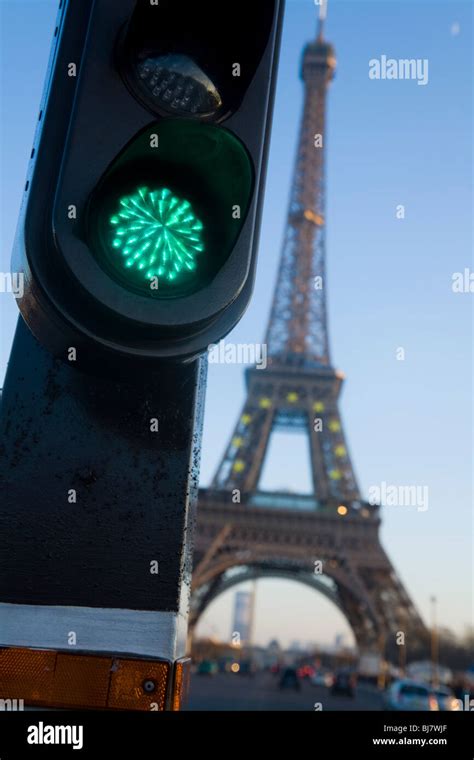 Green French Traffic Light Signal In Paris With The Eiffel Tower