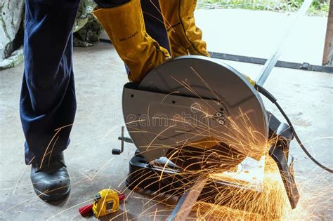 A Worker Using A Fiber Machine Cutting Steel Sparks Stock Photo Image