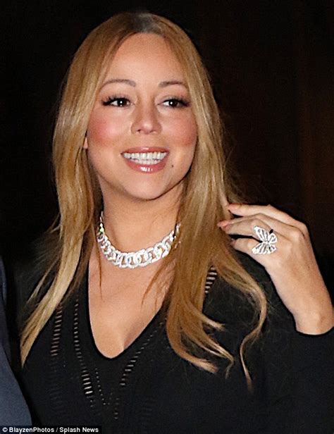 Mariah Carey Shows Off Her Fabulous Curves In Plunging Lbd In New York