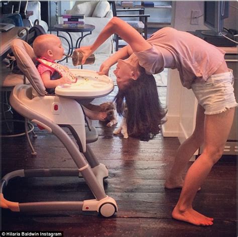 Hilaria Baldwin Shows Off Lean Figure In Yoga Pose Feeding Daughter