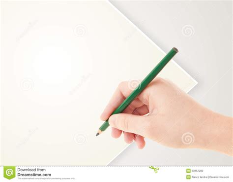 Human Hand Drawing With Pencil On Empty Paper Template