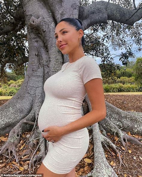 reece hawkins pregnant fiancée london goheen flaunts her blossoming bump in skintight dress