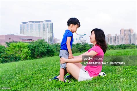 Asian Mother And Son Playing Game High Res Stock Photo Getty Images