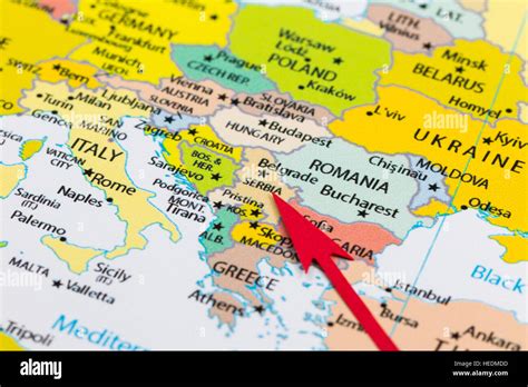 Red Arrow Pointing Serbia On The Map Of Europe Continent Stock Photo