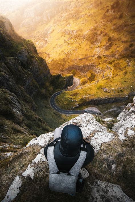 Hd Wallpaper The Best Views Man Sitting On Edge Of Cliff Looking Down