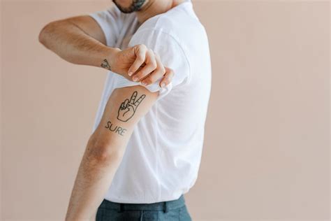 Man Tattoos His Arms Premium Photo Rawpixel