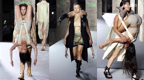 models walk the runway carrying other models in bizarre rick owens show youtube