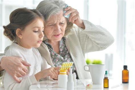 Premium Photo Granddaughter Takes Care Of A Sick Grandmother