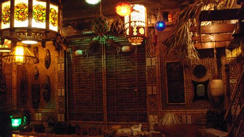 Tiki refers to large wood and stone carvings of humanoid forms in central eastern polynesian cultures of the pacific ocean. Tiki bar decor at home -- readers photos of their tiki style