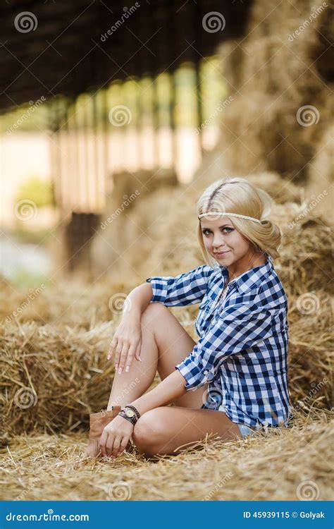blonde woman resting on hay in rural areas stock image image of country model 45939115
