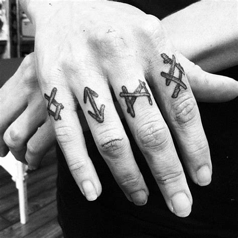 Rune tattoos that you can filter by style, body part and size, and order by date or score. Rune tattoos, inspired by Ovate's rune rings. | Finger tattoos, Knuckle tattoos, Finger tattoo ...