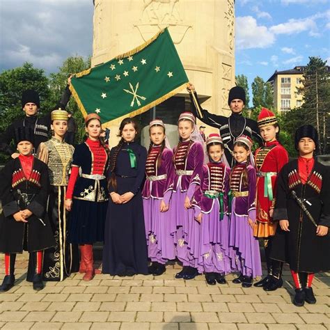 Group Of Circassians Waving The Flag Of Circassia An Ancient Country