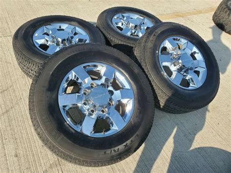GMC Sierra Denali Chrome OEM Wheels And Goodyear Michelin LTX A T Tires