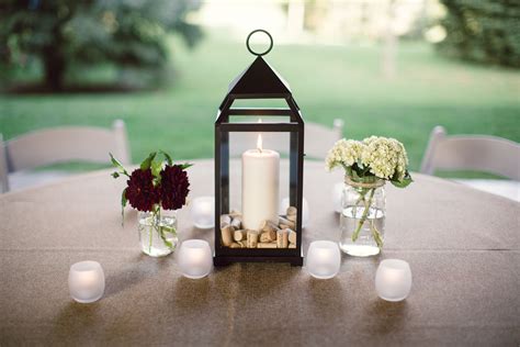 Lantern Centerpiece With Candles And Flowers