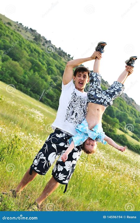 Upside Down Stock Photo Image Of Lift Parent Adult 14596194